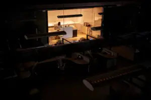 Office worker working late in an otherwise dark office