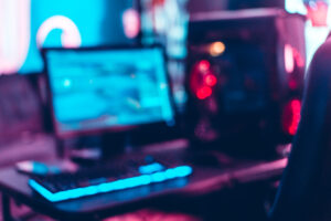 Unfocused and blur background of monitor, keyboard and cpu
